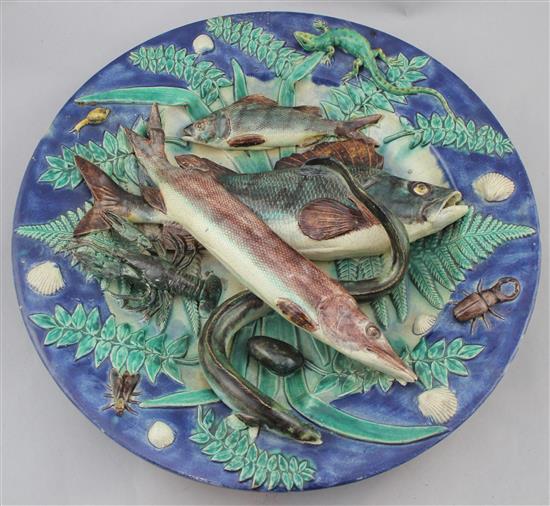 A Palissy style faience dish, late 19th century, 38cm., slight restorations